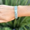 Afeto Presentes Religiosos - Pulseira - São Bento - com oração - em silicone - 6cm diâmetro - 1cm de altura